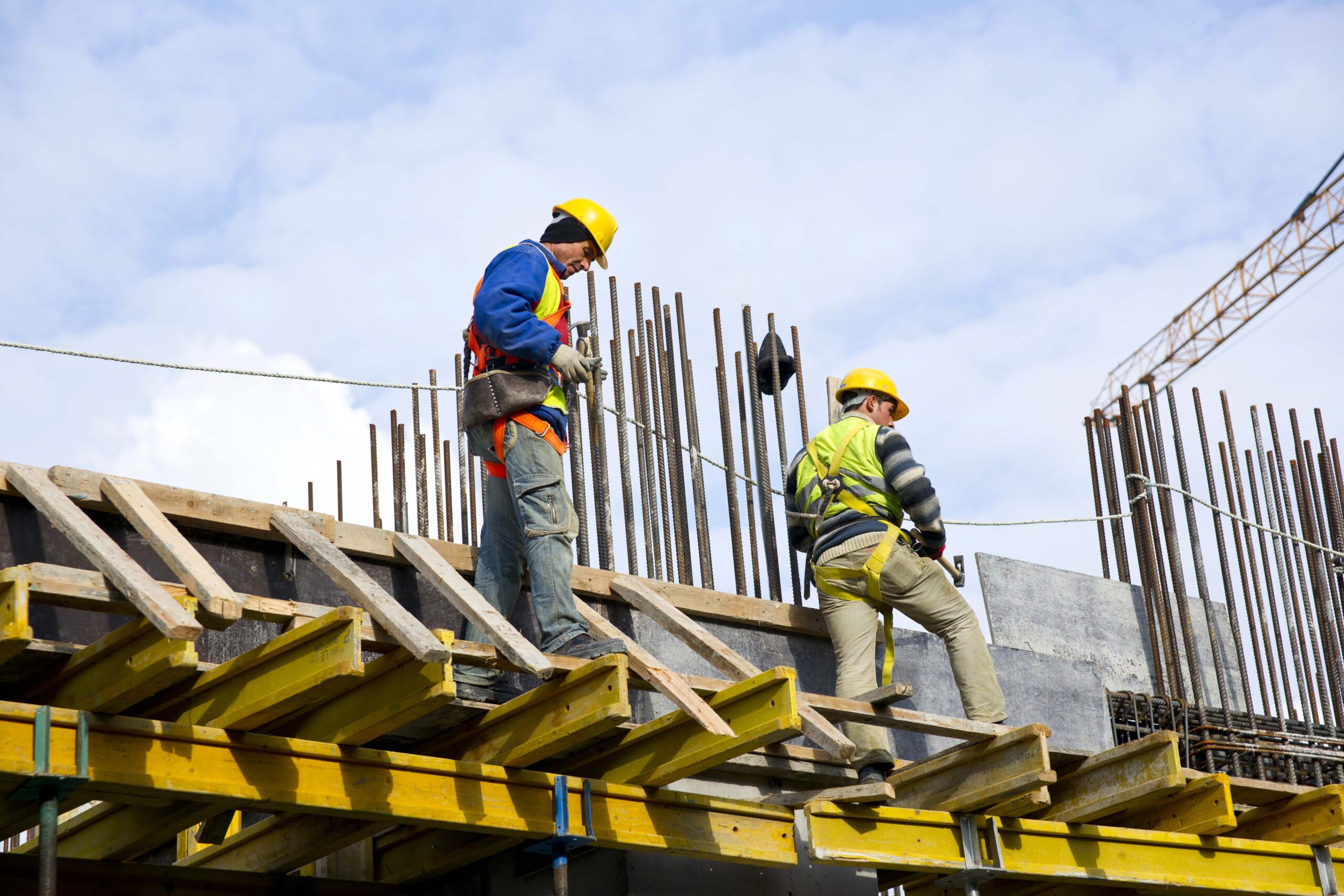 workers examining work scaled at ABS Enterprize